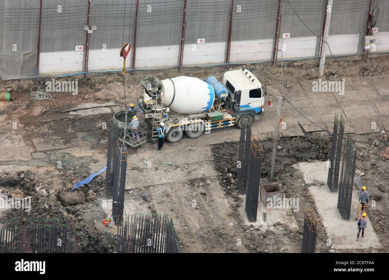 Top View the Cement truck is Working on The Construction site. Stock Photo