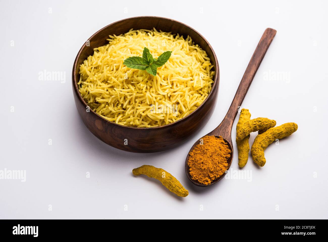 Cooked turmeric jasmine rice with powdered curcumin or Haldi, Indian