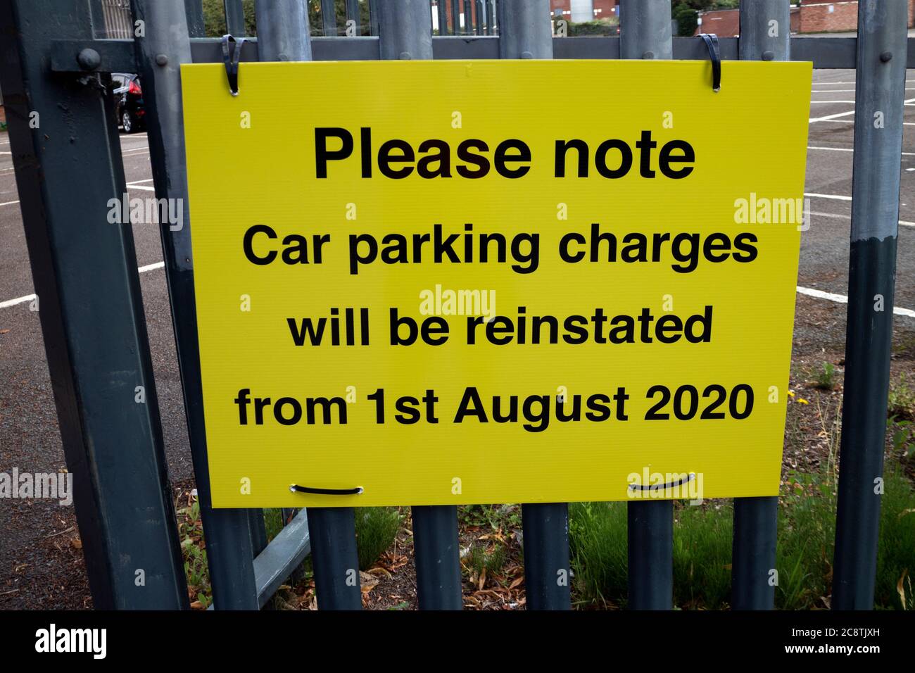 Car park charges reinstated sign during Covid-19 pandemic, UK Stock Photo