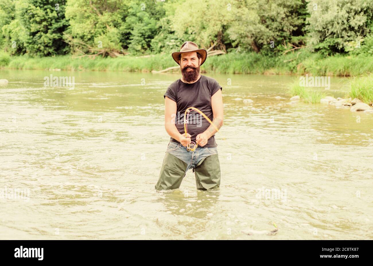 Pro Fishing Bearded Fisher In Water Hobby And Sport Activity Pothunter Fisherman With Fishing Rod Mature Man Fly Fishing Man Catching Fish Summer Weekend Big Game Fishing Stock Photo Alamy Pro Fishing Bearded Fisher In Water Hobby And Sport Activity Pothunter Fisherman With Fishing Rod Mature Man Fly Fishing Man Catching Fish Summer Weekend Big Game Fishing Stock Photo Alamy