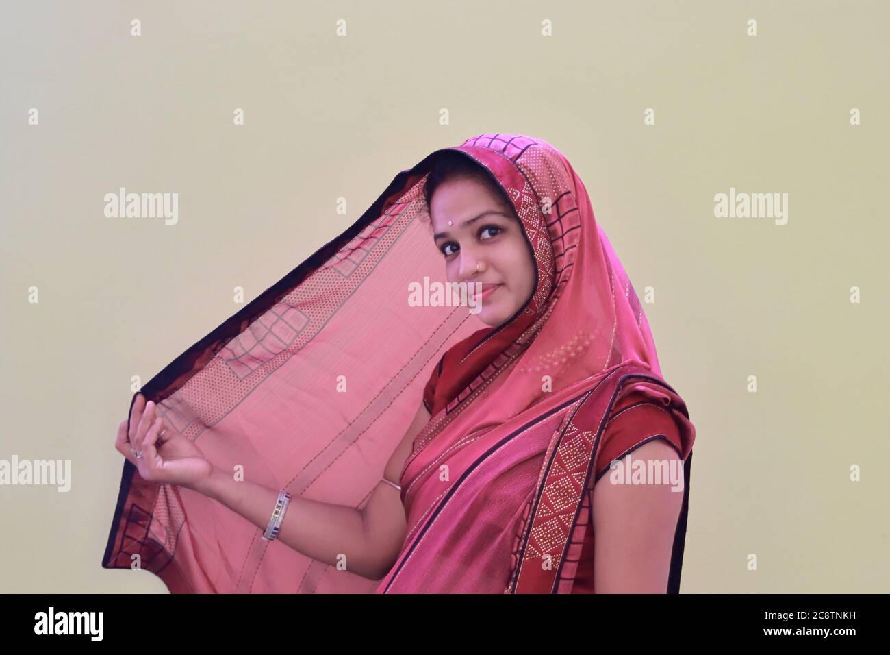 An asian girl in saree with white background Stock Photo