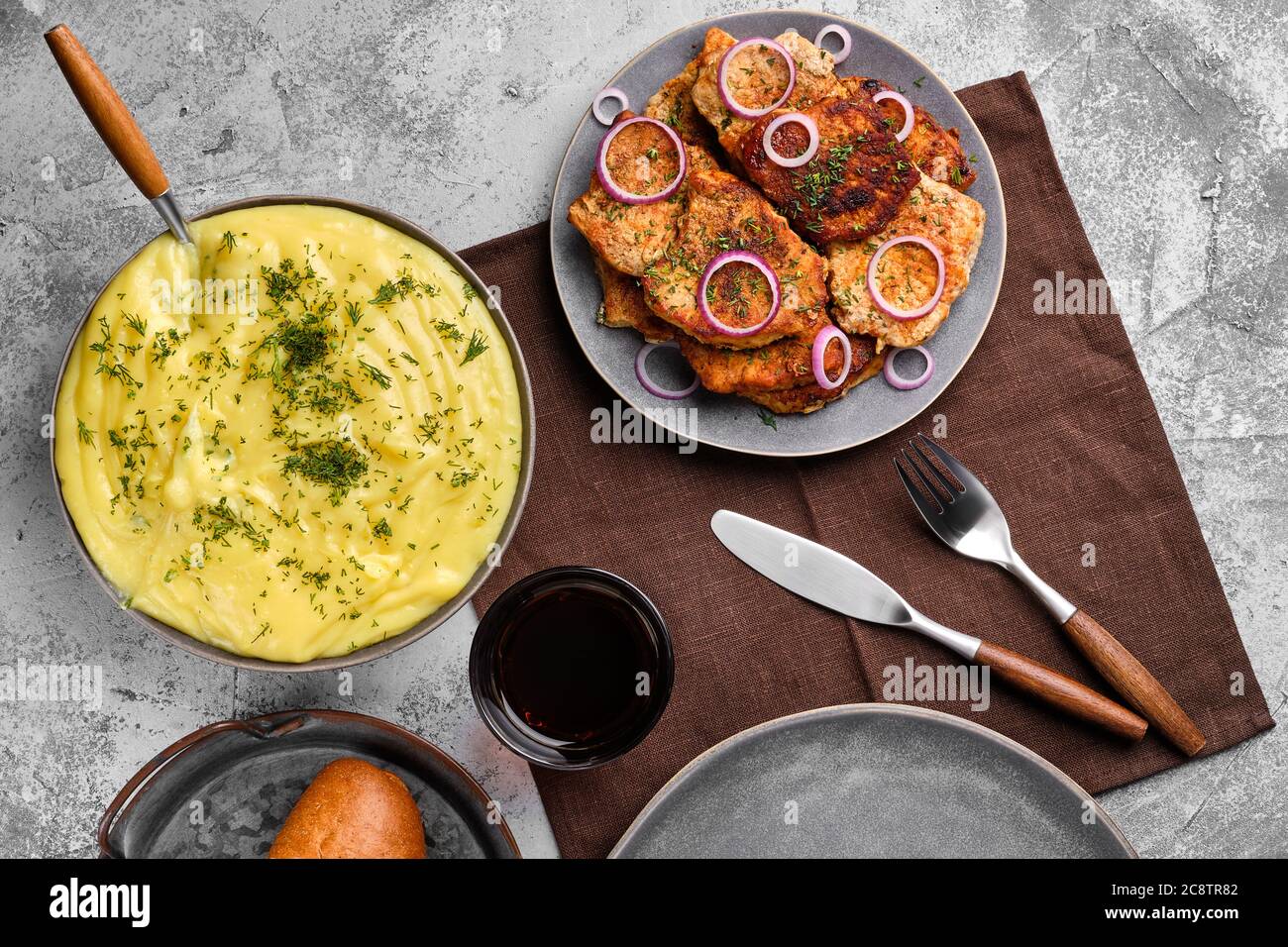 Top view of roasted pork fillet mignon , served with mashed potato and red onion and dill Stock Photo