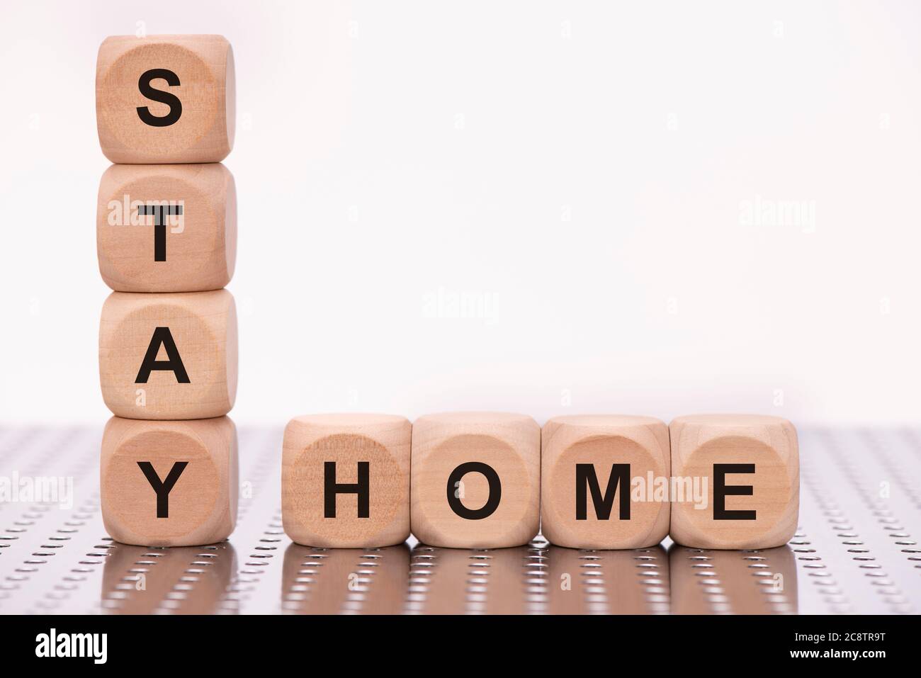 Stay home written on wooden cubes Stock Photo