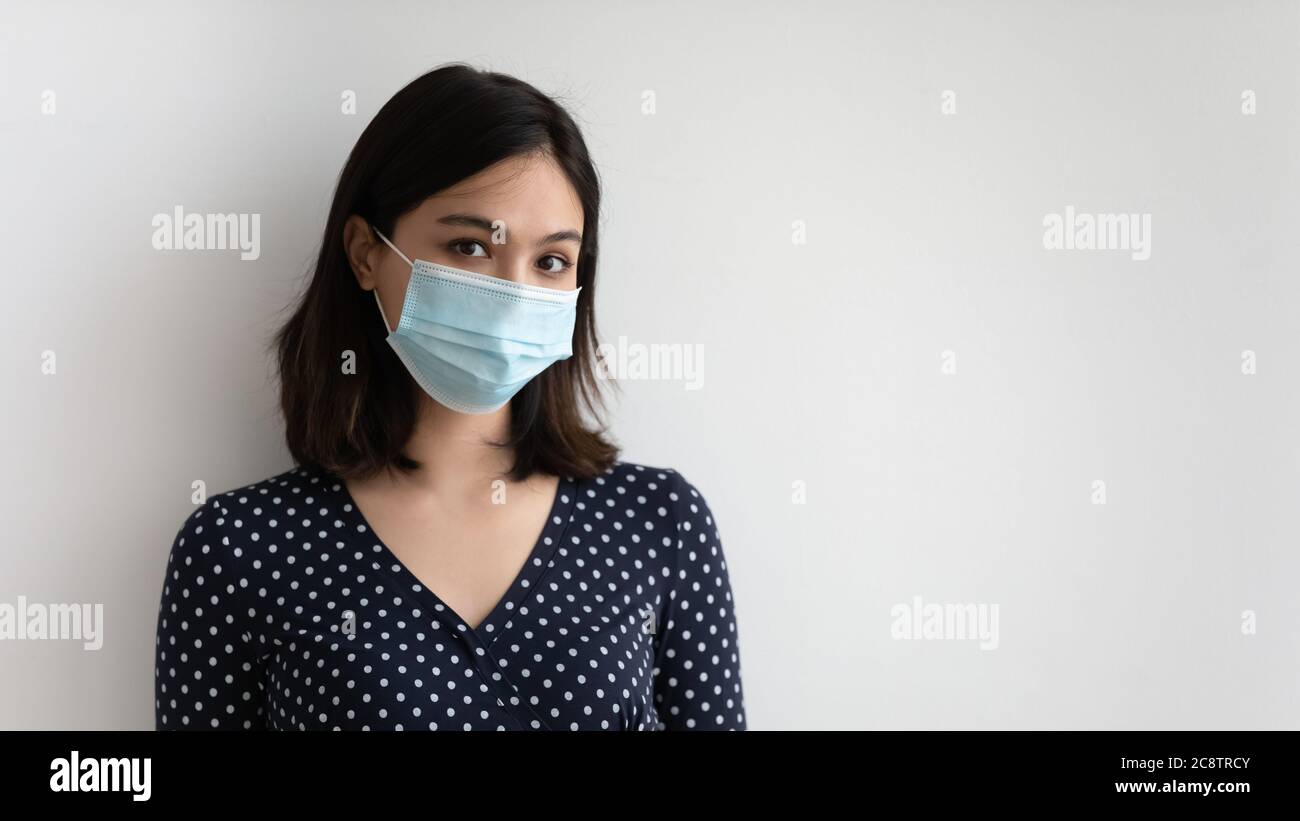 Portrait of young Vietnamese woman in facial mask Stock Photo Alamy