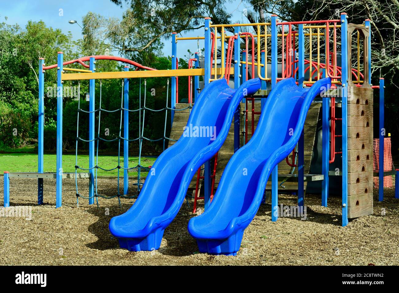 A colourful playground, inviting kids to play there. Combination