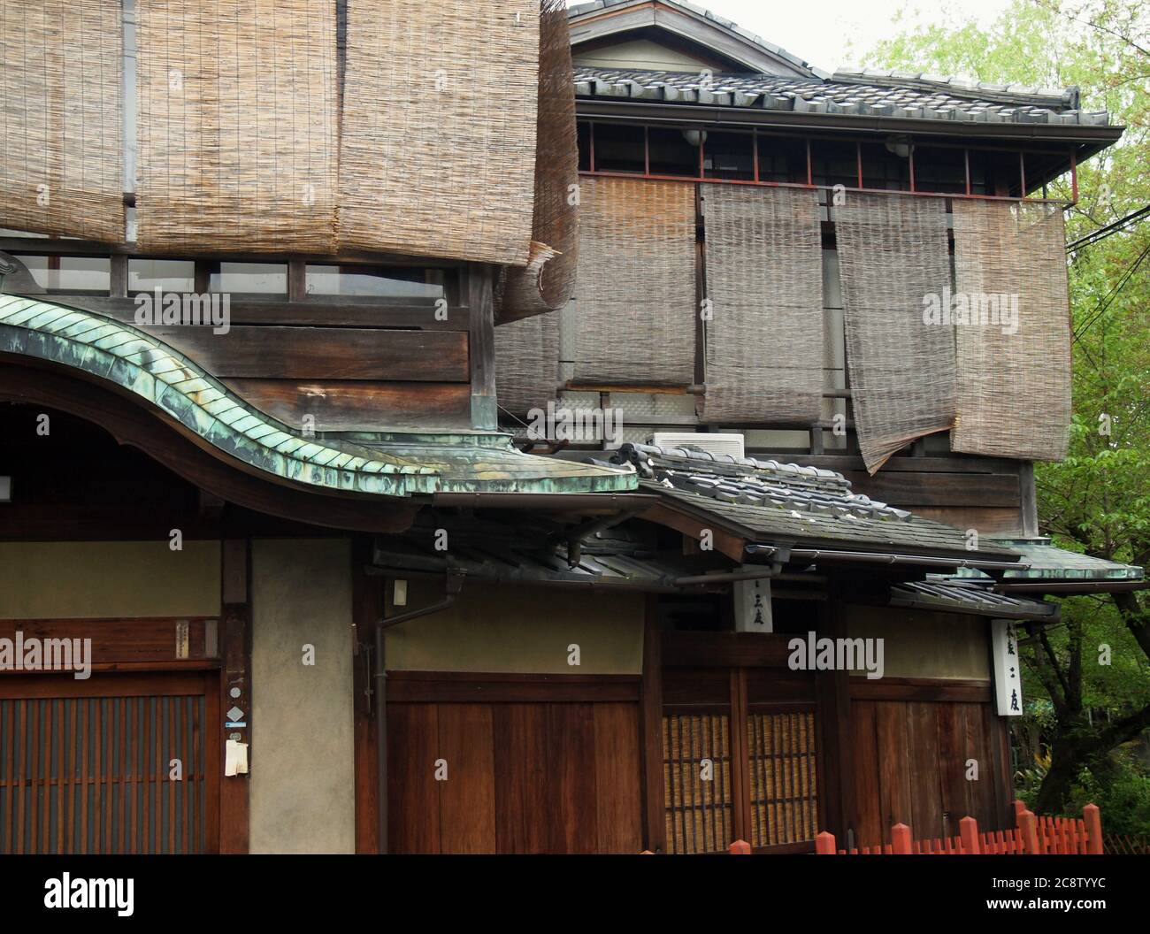 Gojo Rakuen (5th Street Paradise), red light district of old Kyoto The area was a mix of inns, theaters, restaurants, bars, and brothels. Many of the Stock Photo