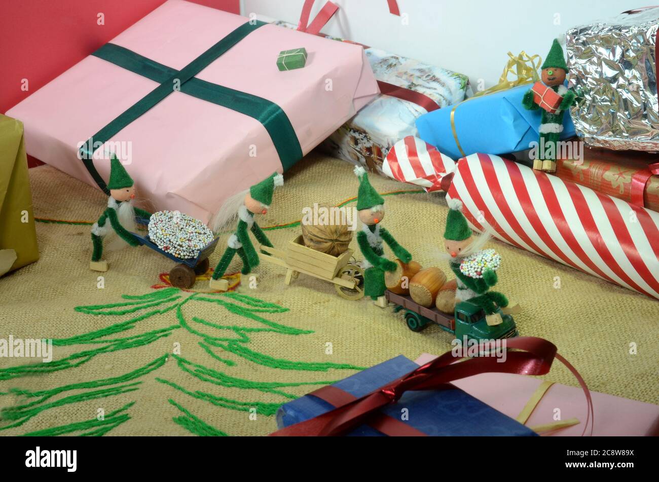 PIxie gang on a robbery mission between christmas parcels. Stock Photo