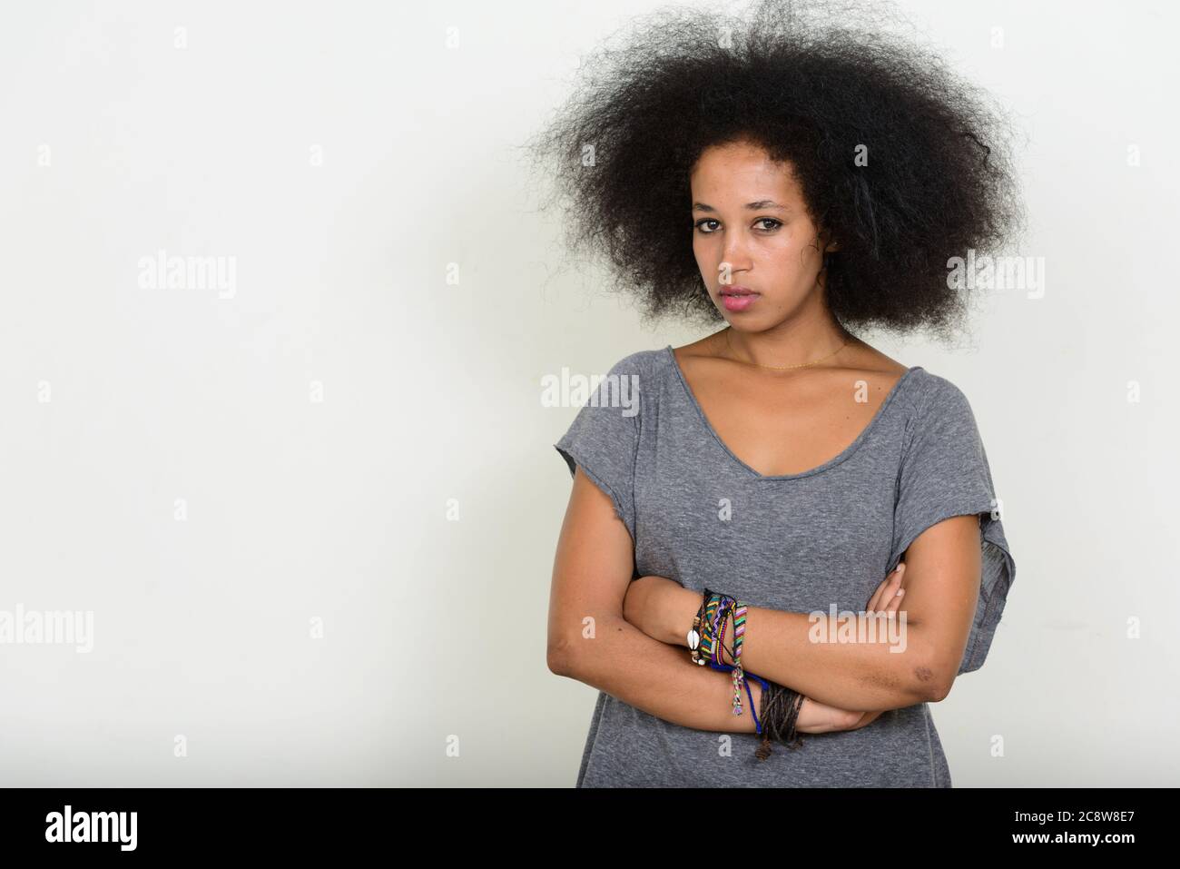 Portrait of young beautiful African woman with Afro hair Stock Photo ...