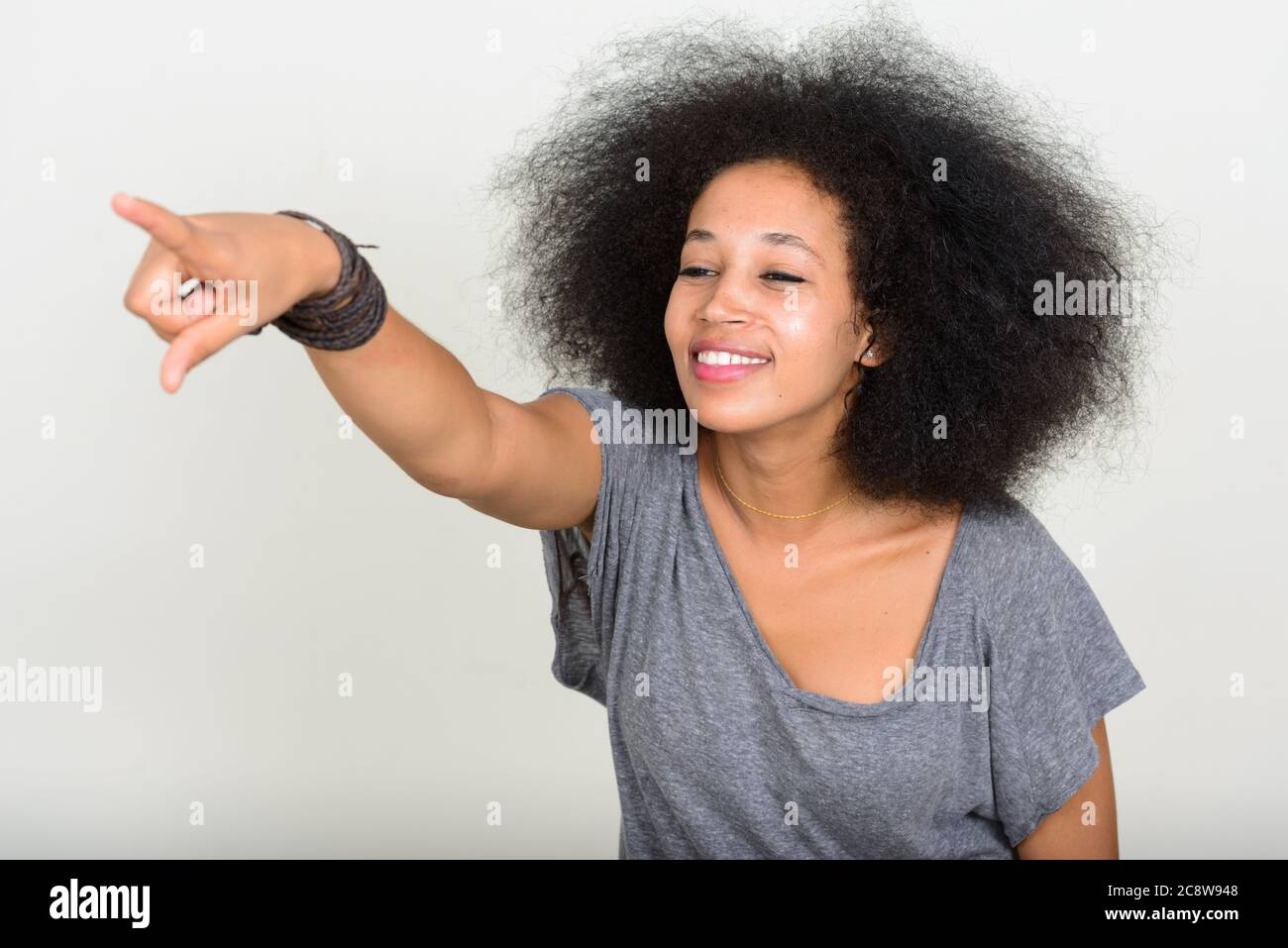 Portrait of young beautiful African woman with Afro hair Stock Photo ...