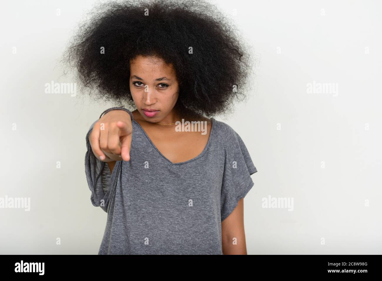 Portrait of young beautiful African woman with Afro hair Stock Photo ...