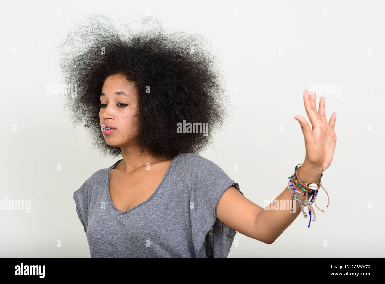 Portrait of young beautiful African woman with Afro hair Stock Photo ...