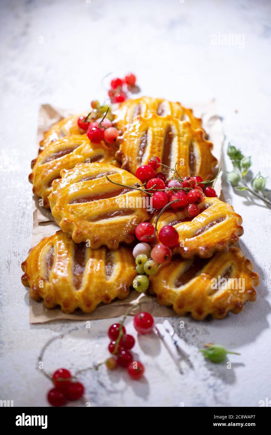 Fruit cookies.A crispy redcurrant dessert.Homemade pastries.Healthy food and drink. Stock Photo