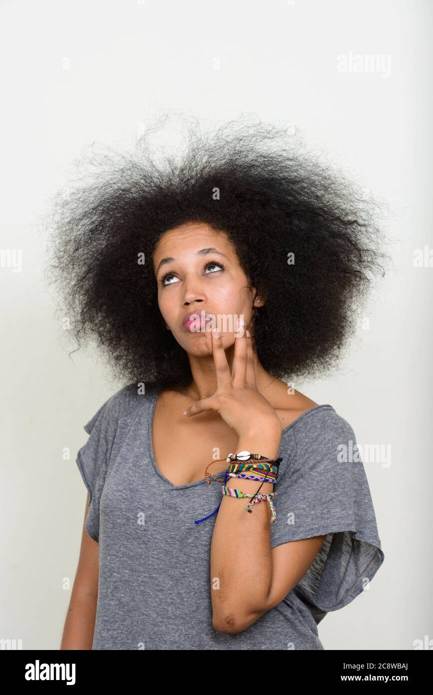 Portrait of young beautiful African woman with Afro hair Stock Photo ...