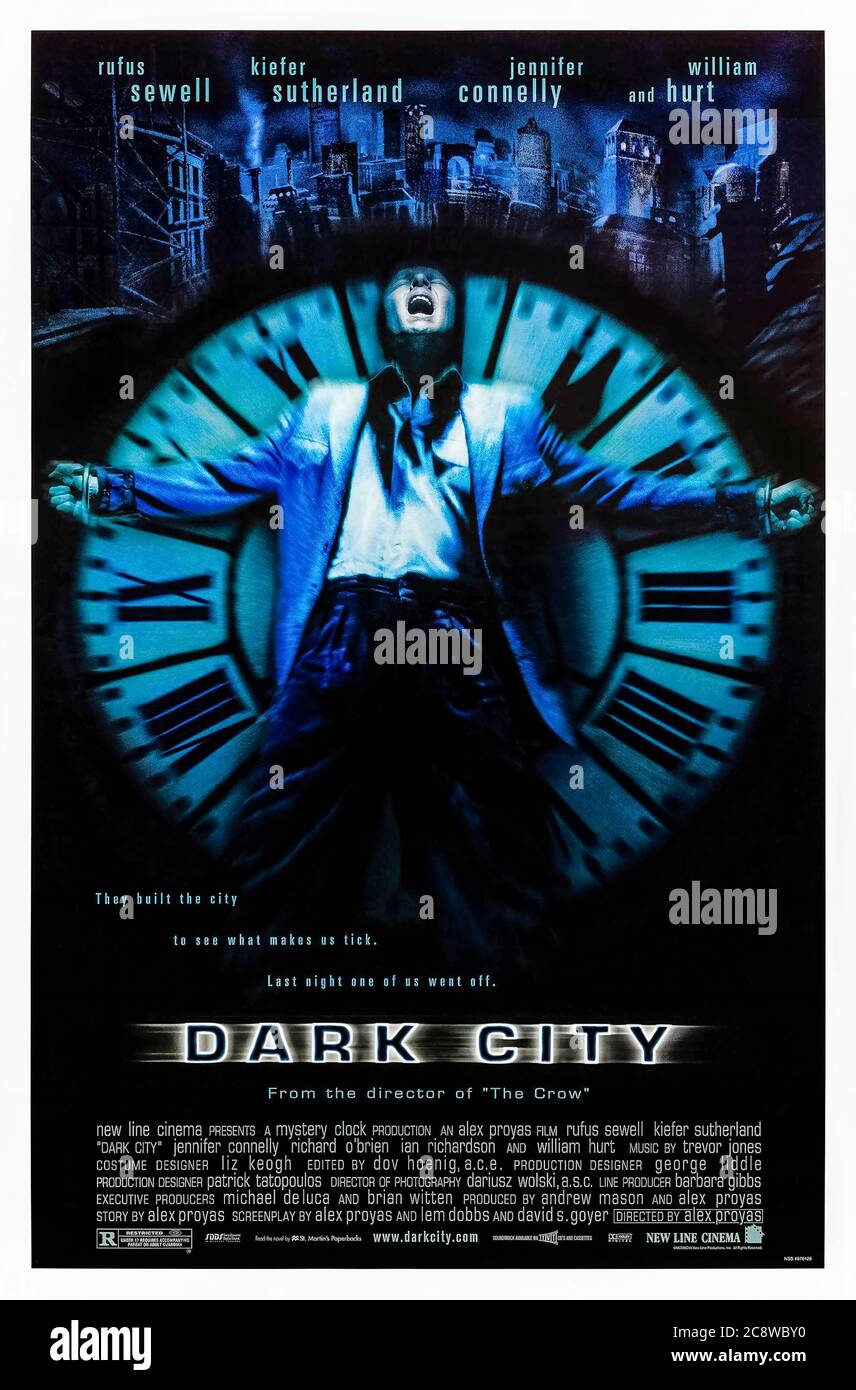 Dark City (1998) directed by Alex Proyas and starring Rufus Sewell, Kiefer Sutherland, Jennifer Connelly and William Hurt. A man suffering form amnesia discovers his reality is being controlled by an alien race known as The Strangers. Stock Photo