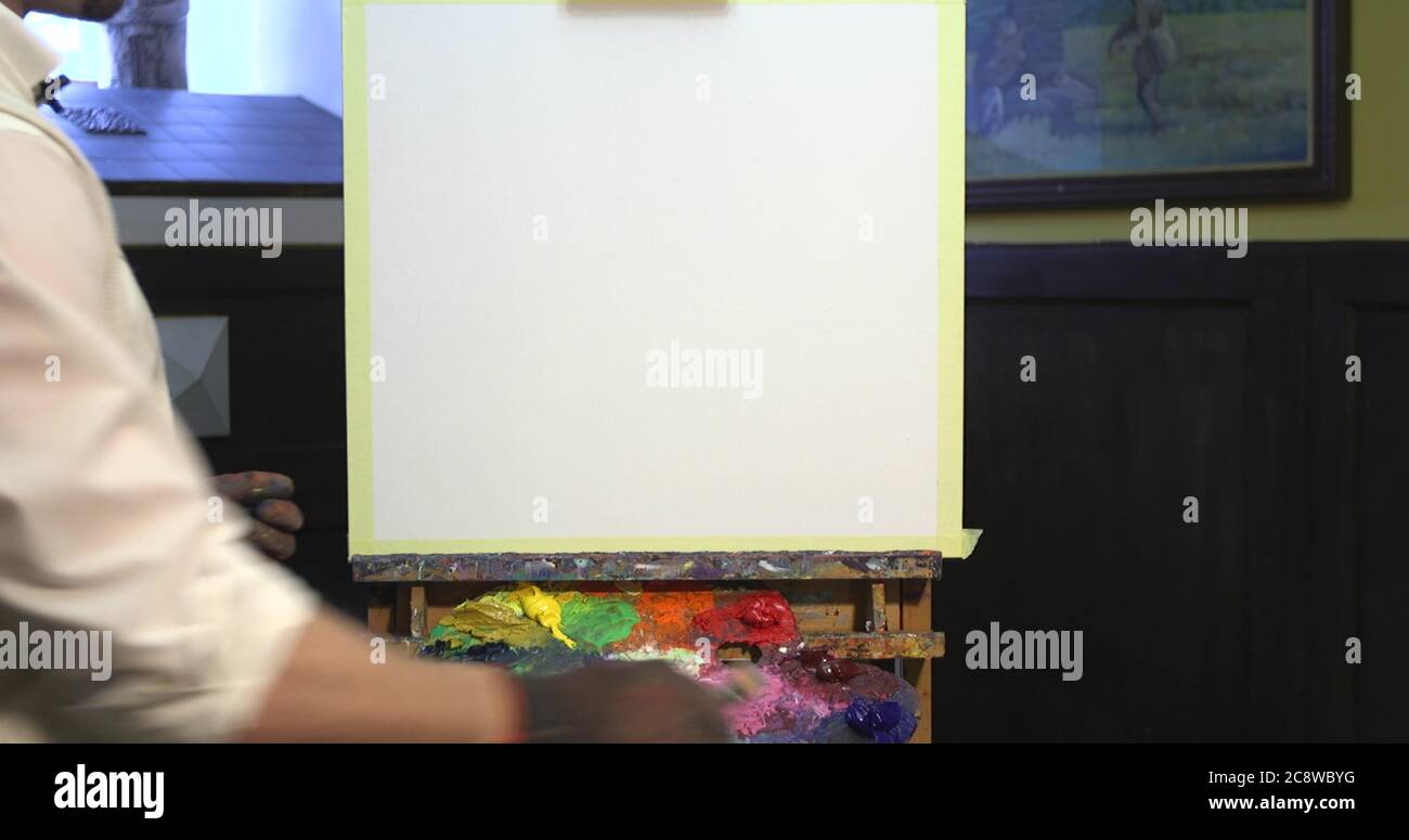 Artist holding paint brush hi-res stock photography and images - Alamy