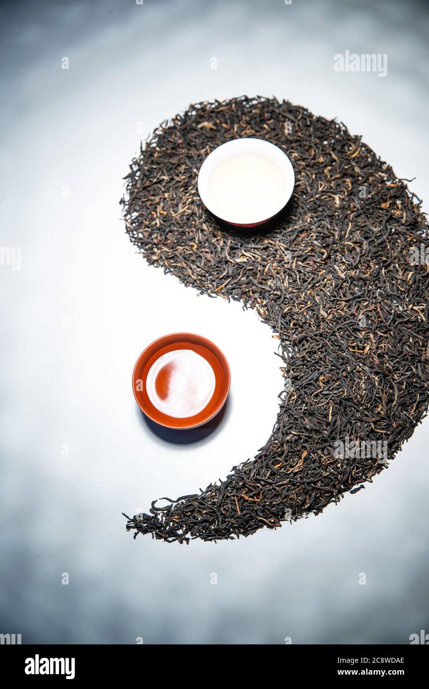 Taiji pattern composed of tea and tea cups Stock Photo - Alamy