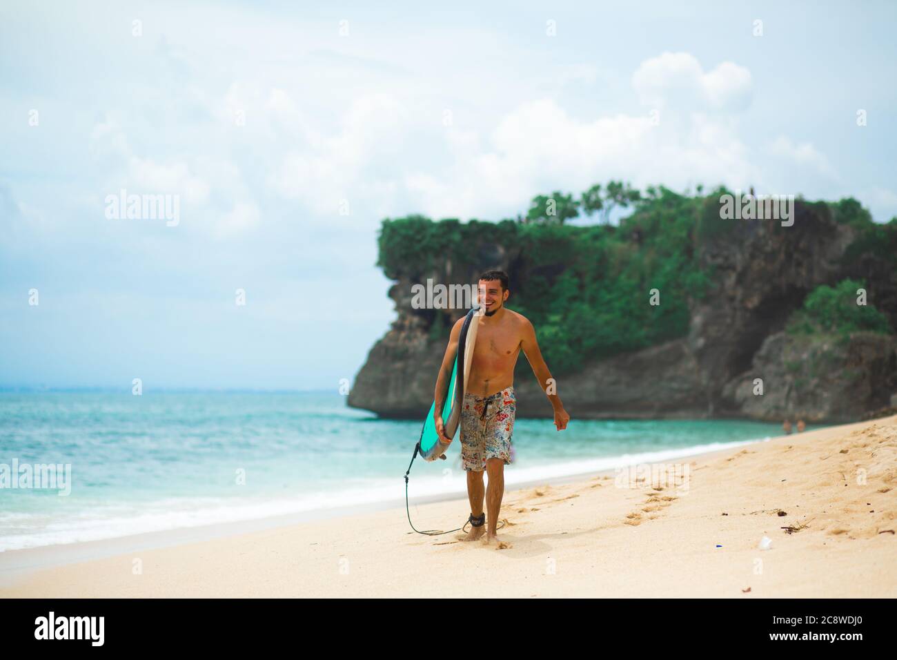 Surfer. Surfing Man With Surfboard Walking On Sandy tropical Beach ...