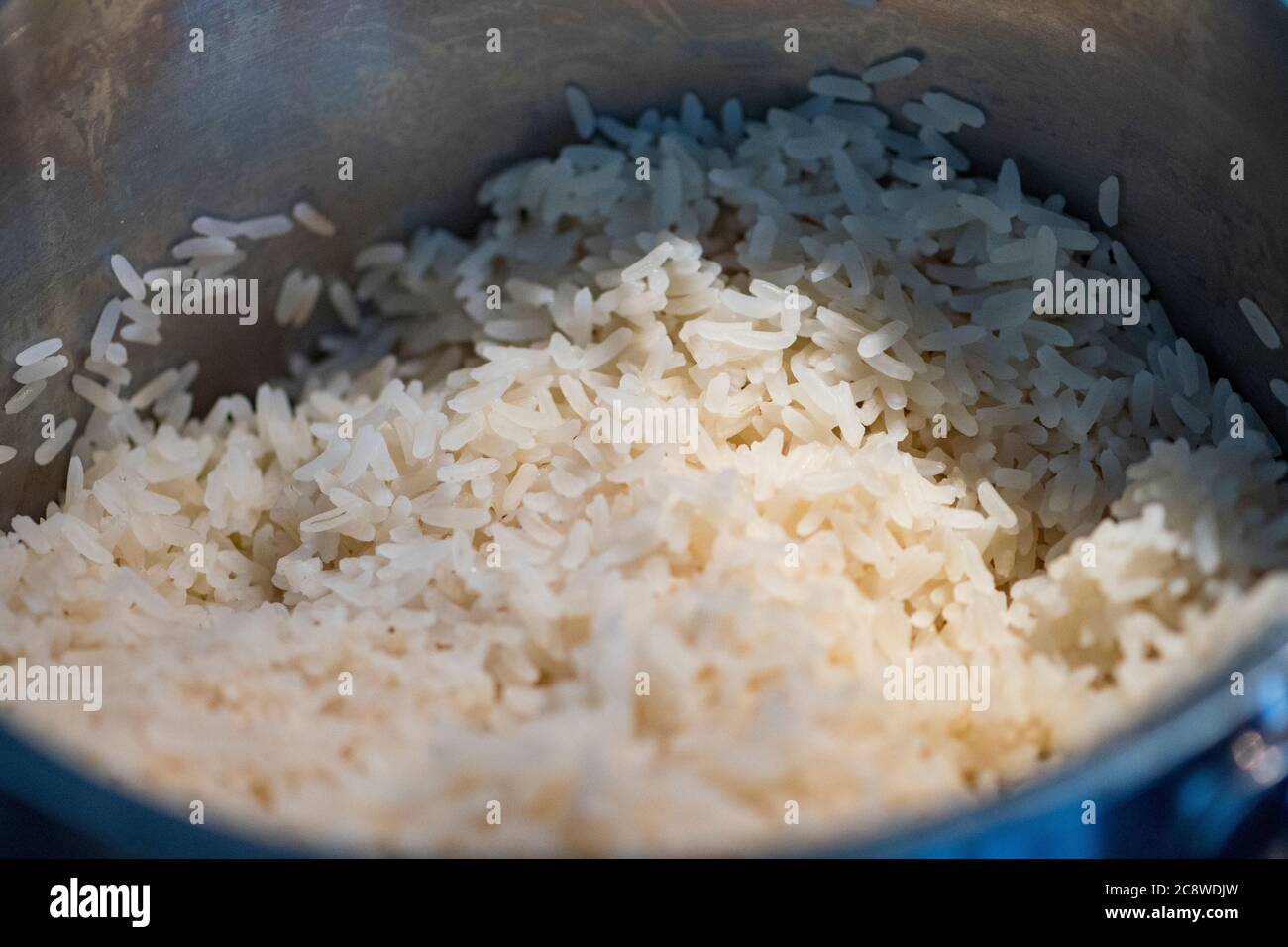 Rice in pot is cooked fast cooking Stock Photo - Alamy