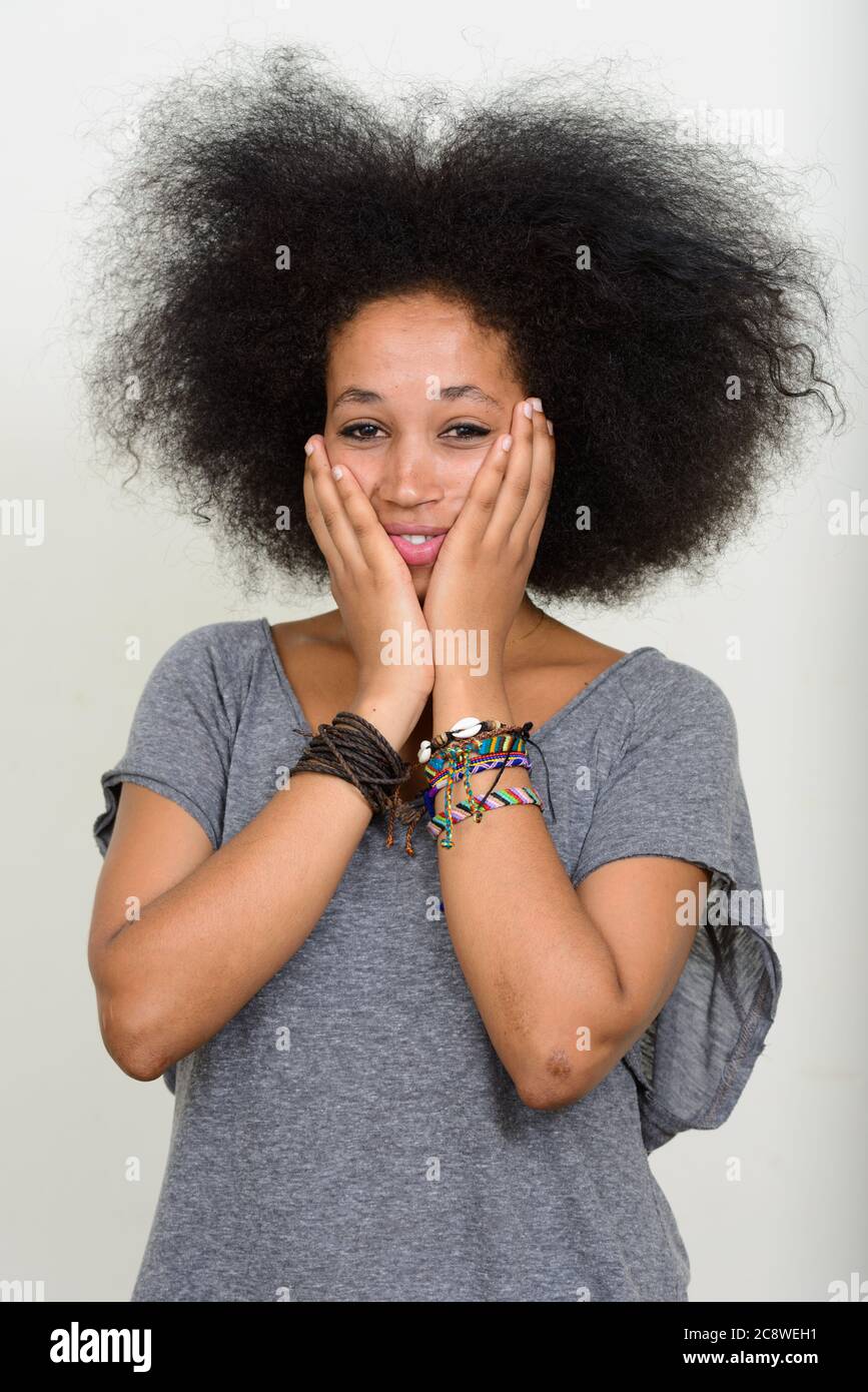 Portrait of young beautiful African woman with Afro hair Stock Photo ...