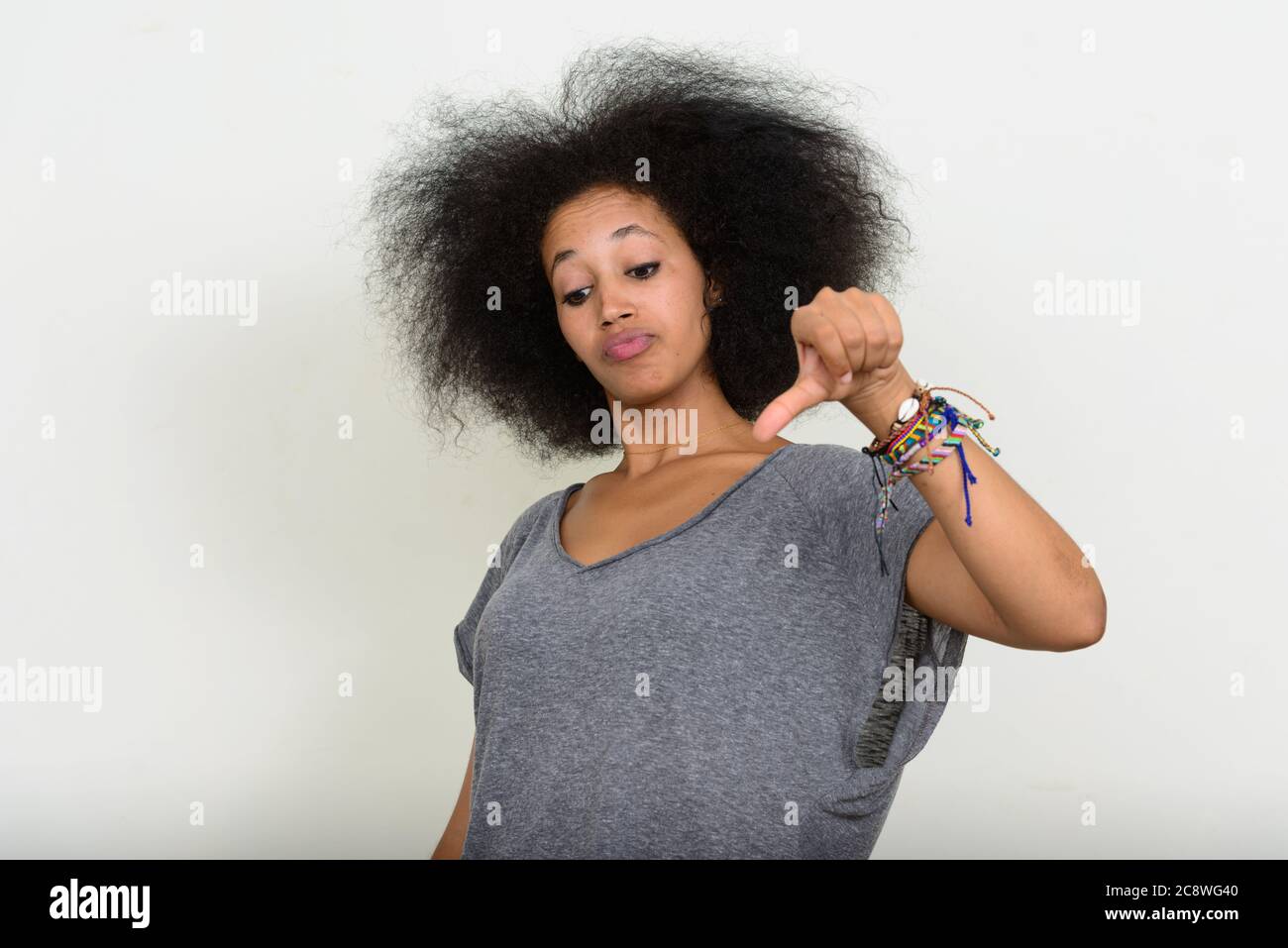 Portrait of young beautiful African woman with Afro hair Stock Photo ...