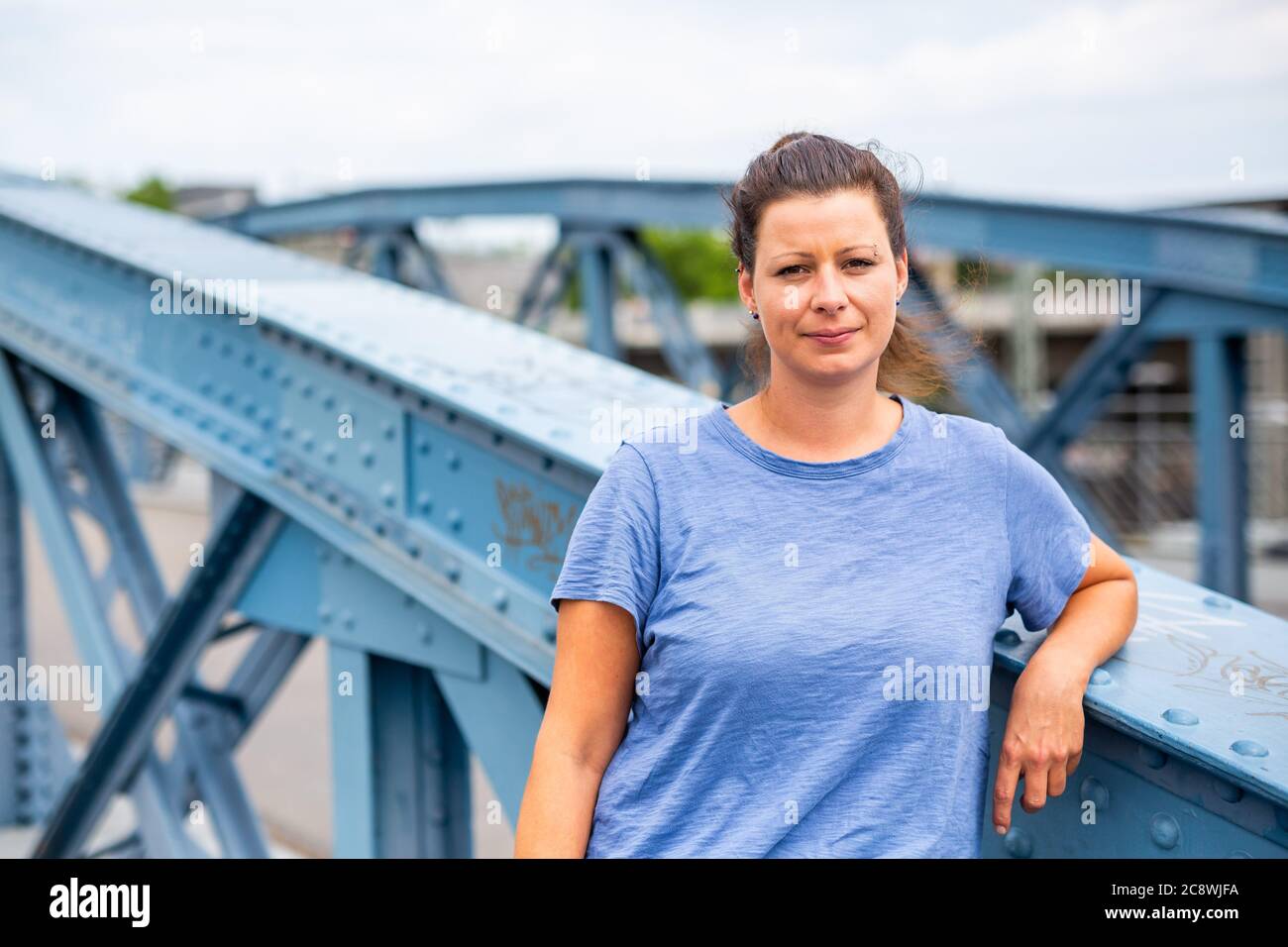 Freiburg, Germany. 22nd July, 2020. Helen Breit, member of the board and spokeswoman of the fan association 'Unsere Kurve e.V.' is standing on the Wiwilibrücke in Freiburg. According to its own statements, the club is a union of fan organisations from the Bundesliga to the regional league. Credit: Philipp von Ditfurth/dpa/Alamy Live News Stock Photo