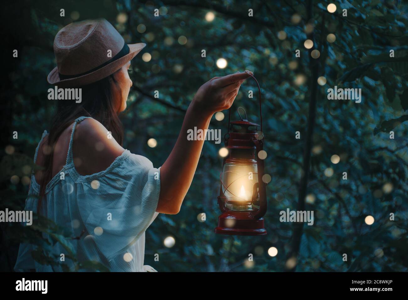 Girl holding a lantern hi-res stock photography and images - Alamy