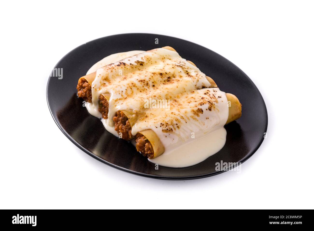 Delicious meat cannelloni pasta isolated on white background Stock Photo