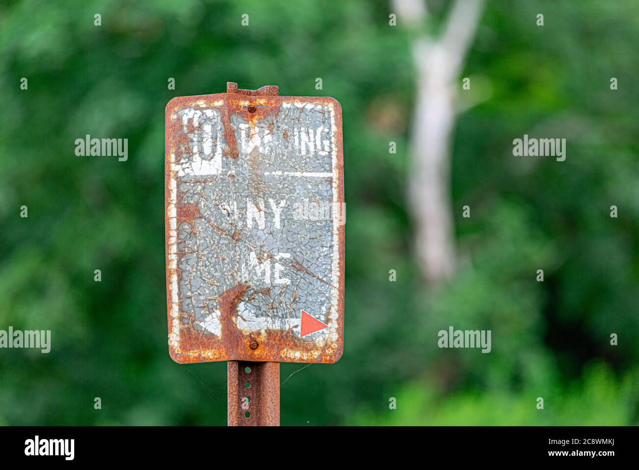 Very old and weathered No Standing sign Stock Photo
