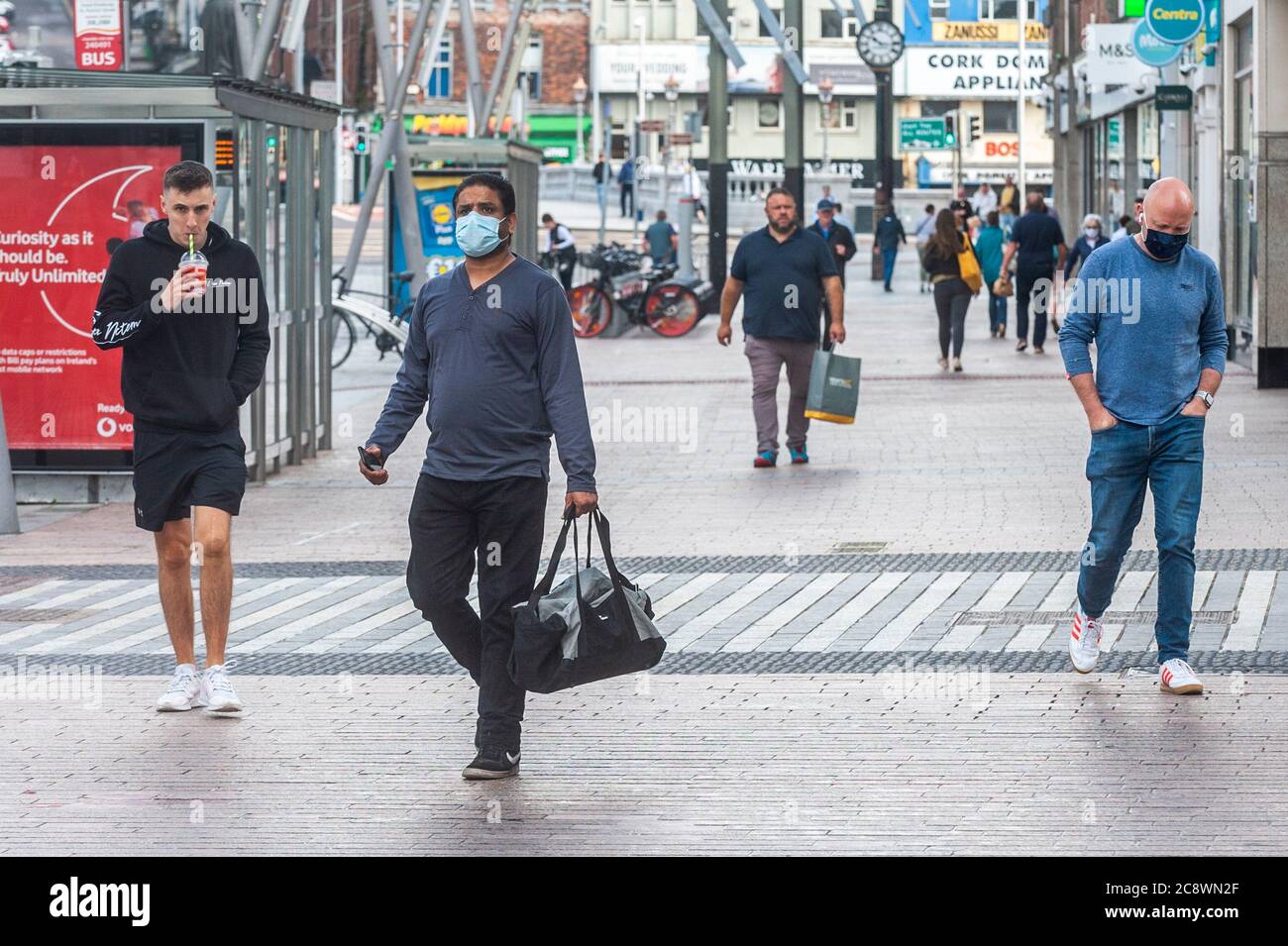 Cork, Ireland. 27th July, 2020. Many people were wearing face masks in Cork City today to protect themselves against Covid-19. Credit: AG News/Alamy Live News Stock Photo