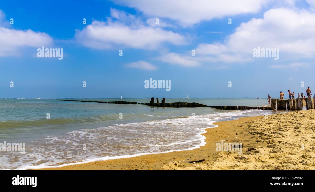 beautiful ocean view with wave breakers on the beach of Breskens, Zeeland, The Netherlands Stock