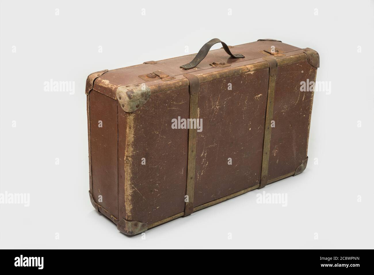 white and tan suitcase