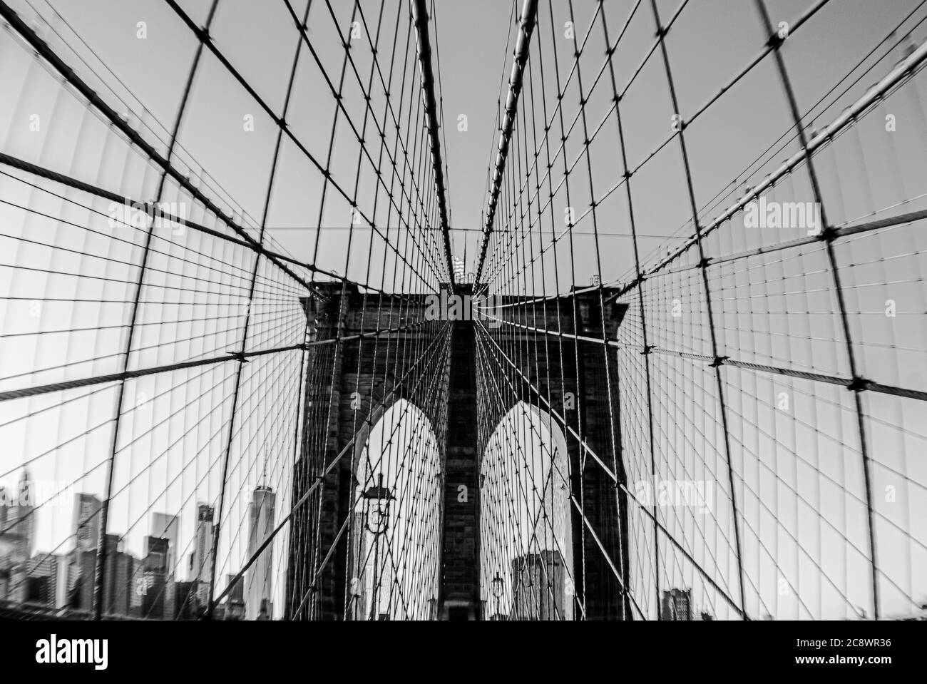 Grayscale shot of Brooklyn Bridge in New York Stock Photo