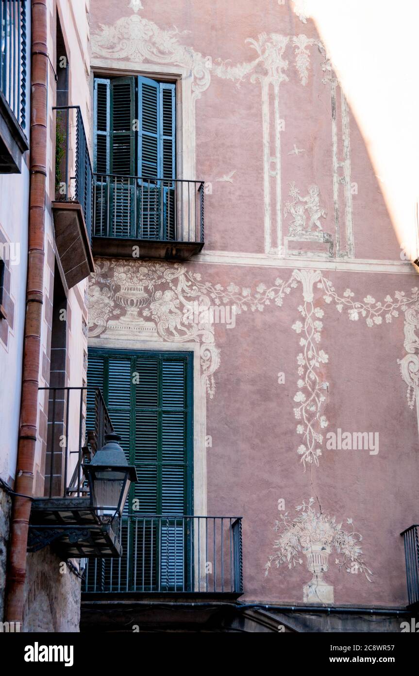 Sgraffito, a baroque gothic style of wall decor scratched into plaster in the Bari Gothic neighborhood of Barcelona, Spain. Stock Photo