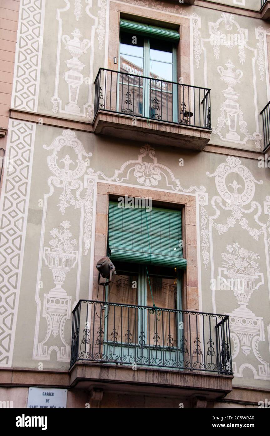 Sgraffito is created by scratching away layers of plaster in barcelona, Spain. Stock Photo