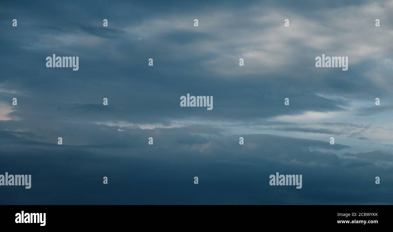 Beautiful cloudy sky, clouds block the sun Stock Photo Alamy