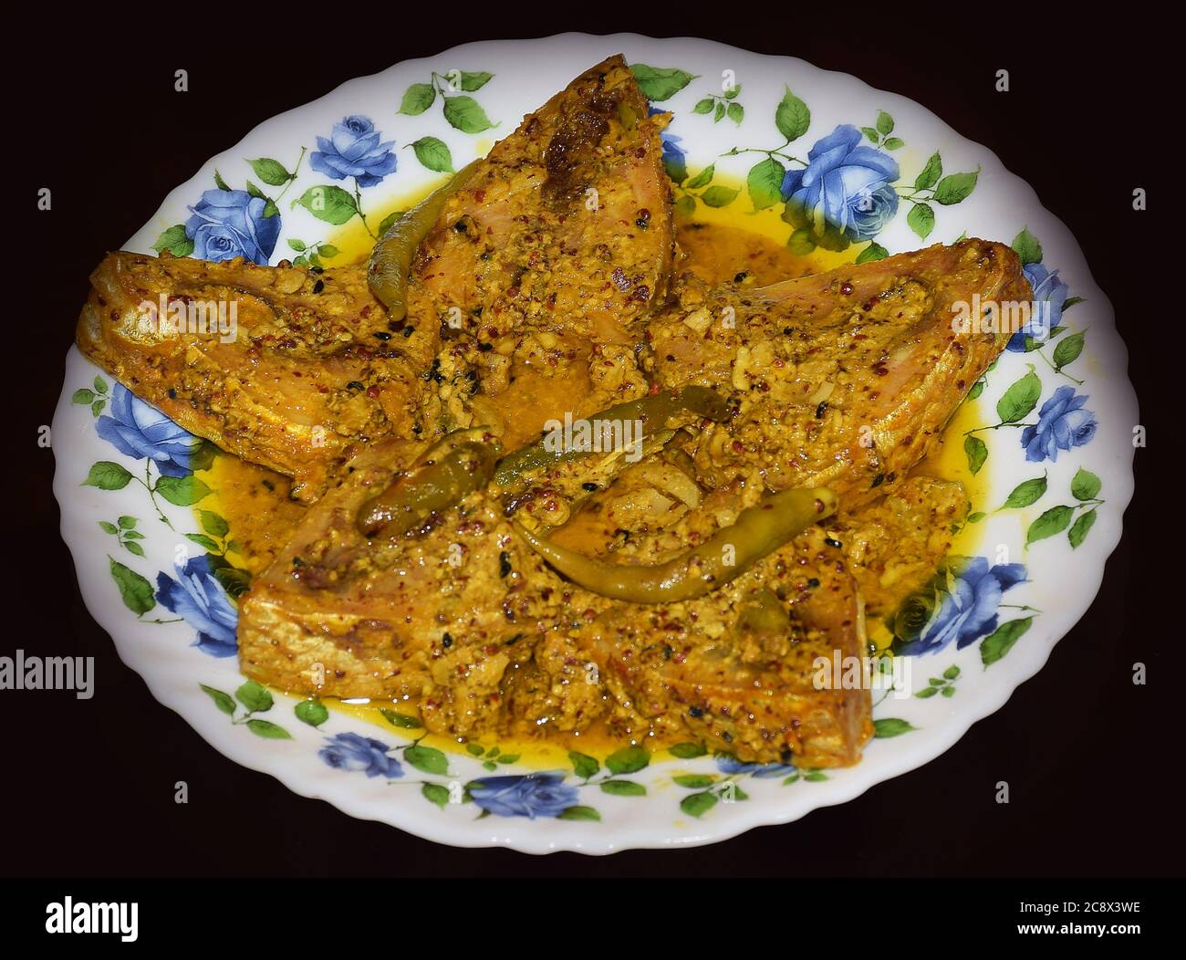 Bengali Food or dish Mustard Hilsa Side Angle Shot. It is also known as Ilish in Bengali