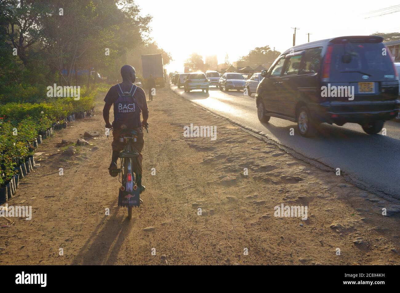 People walking along Ngong Road during the evening rush hour, Ngong