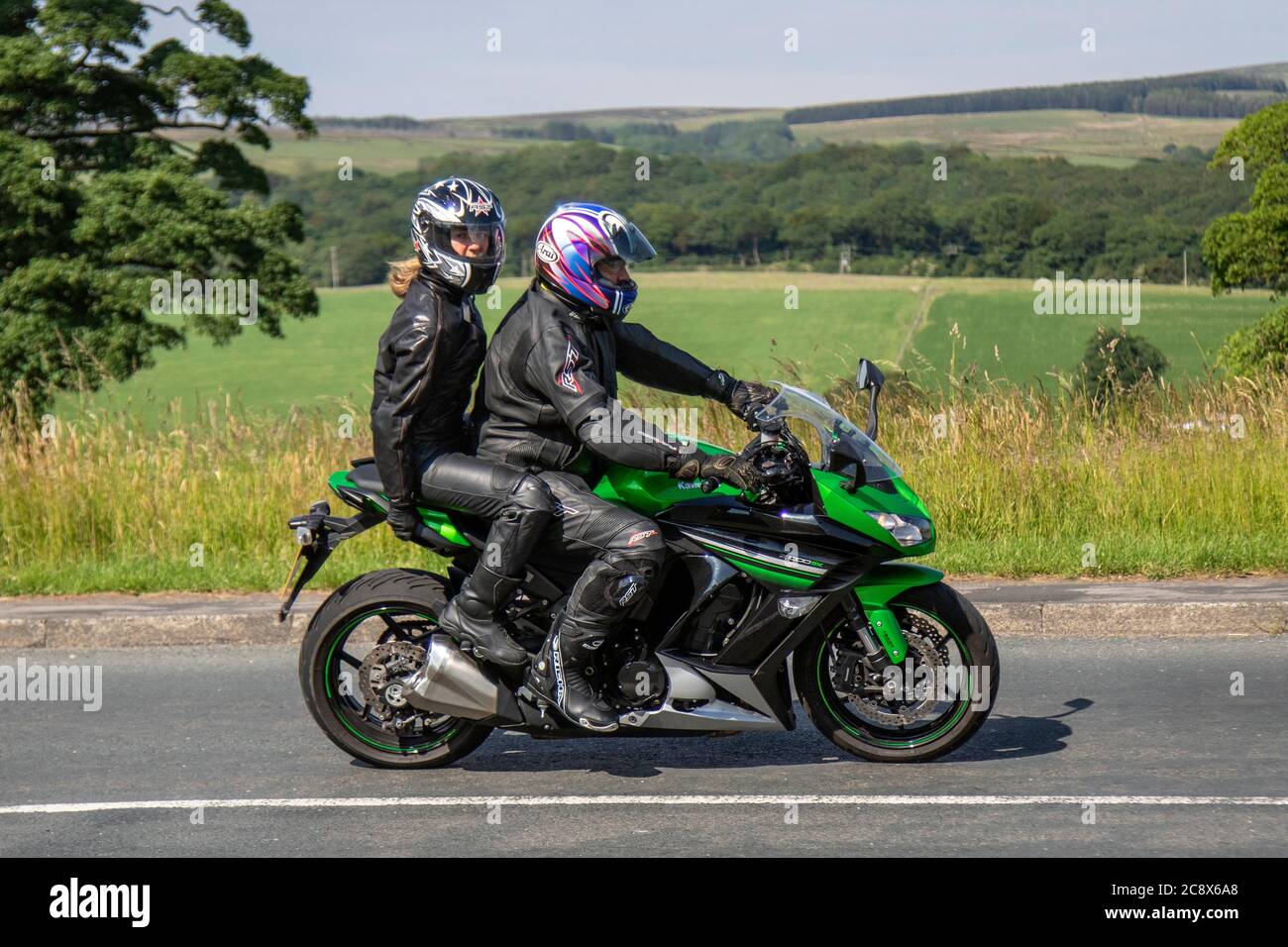 Kawasaki Z1000sx Motorbike rider; two wheeled transport, motorcycles, vehicle, roads, motorbikes, bike riders motoring in Chorley, UK Stock Photo