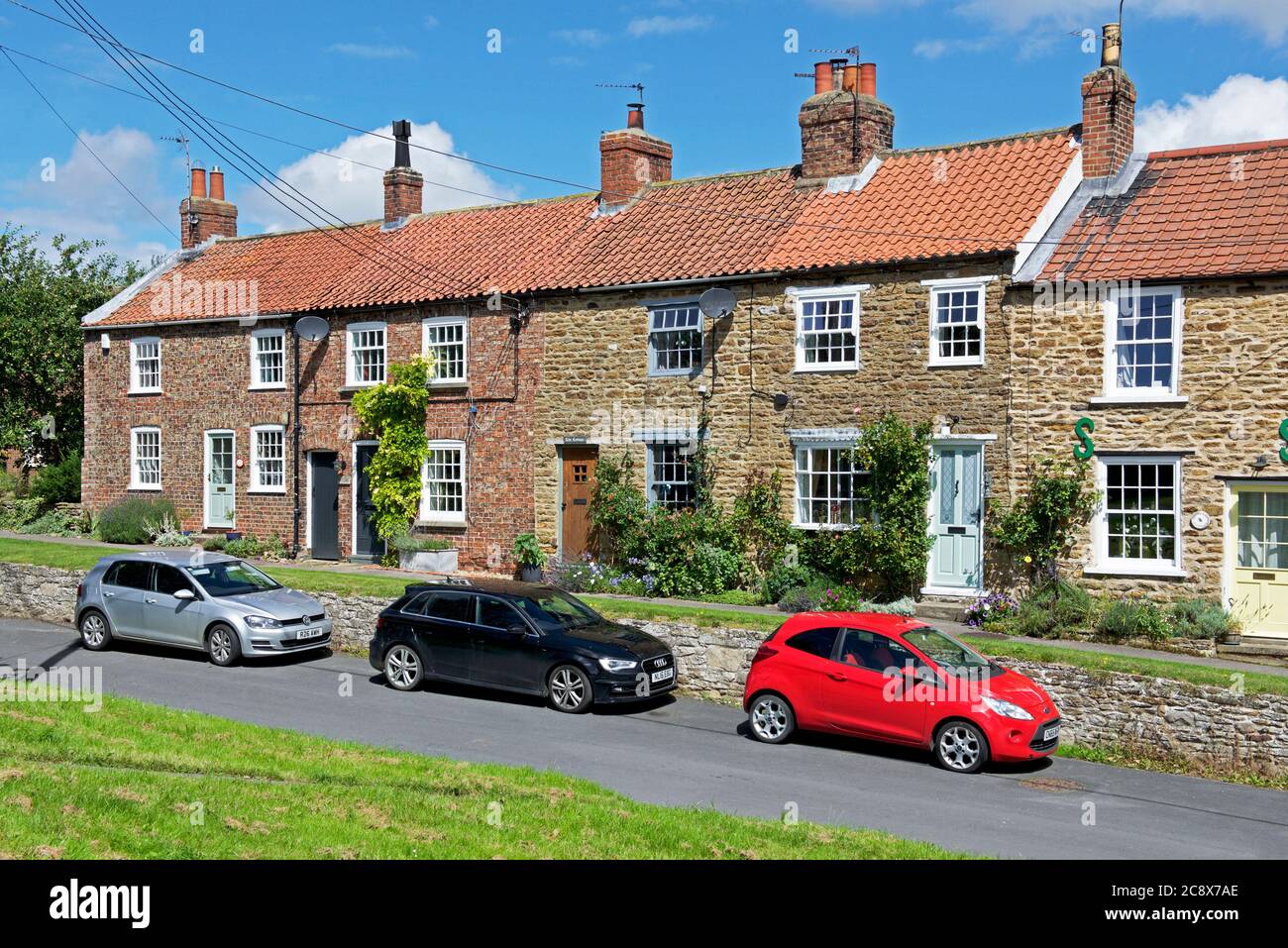 Row of terraced houses in the village of Sheriff Hutton, North Yorkshire, England UK Stock Photo