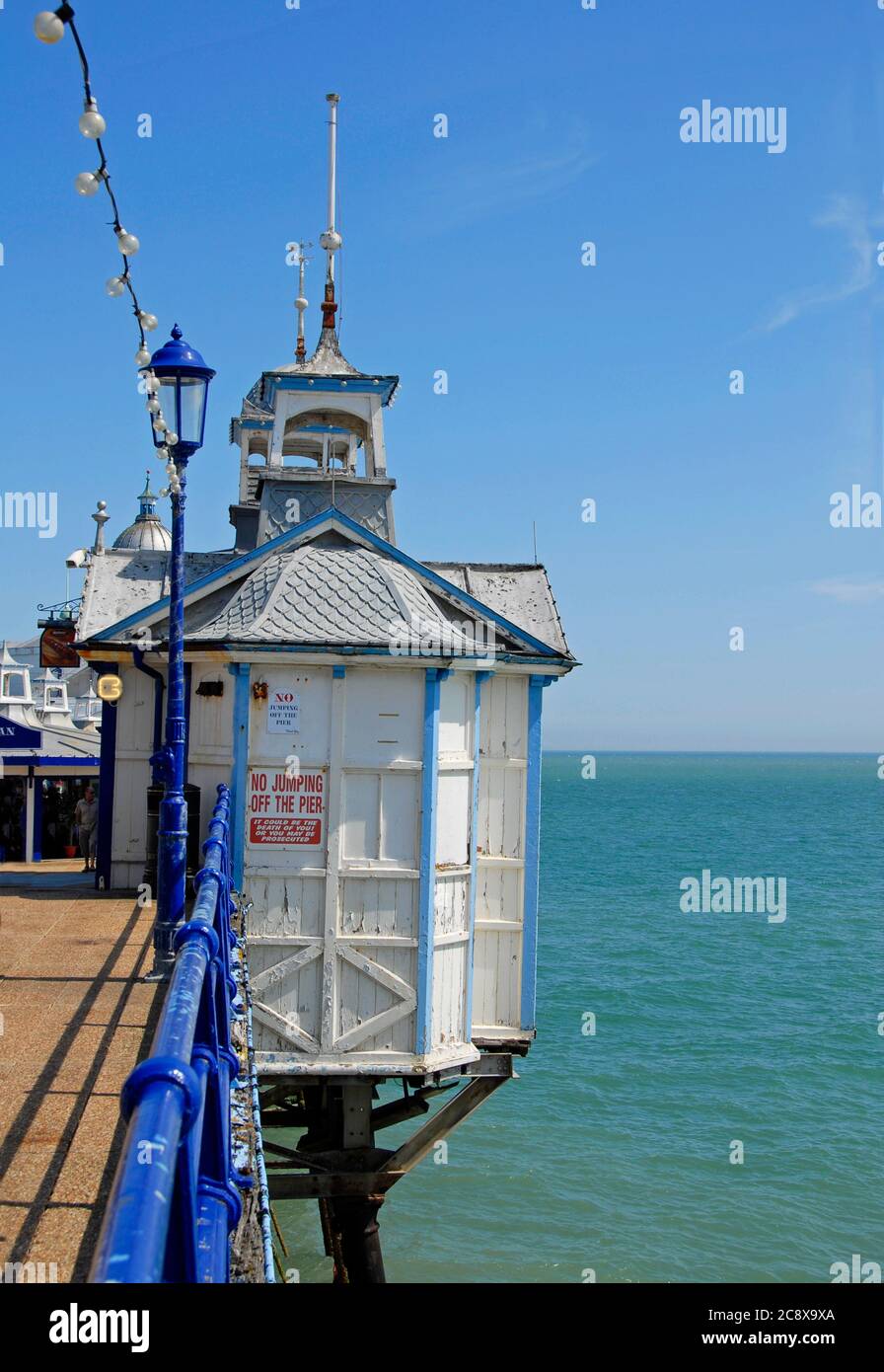 Notice on the side of the pier, Eastbourne pier, East Suusex, England ordering 'No jumping off the pier' Stock Photo