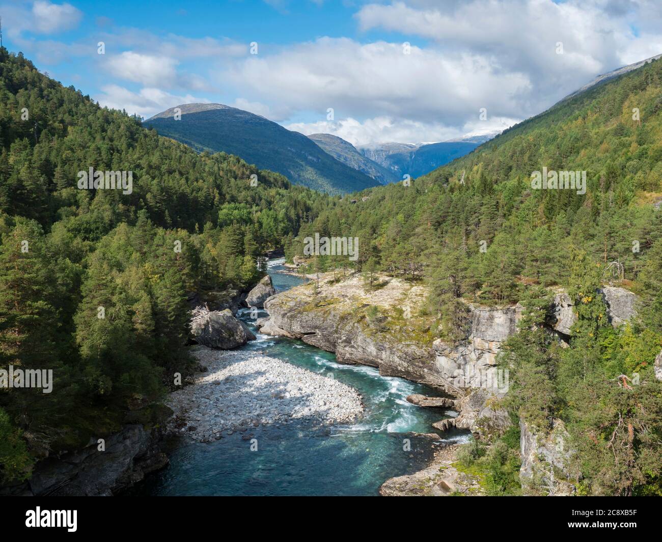 View on azure Rauma river canyon at Romsdalen valley with snow capped ...