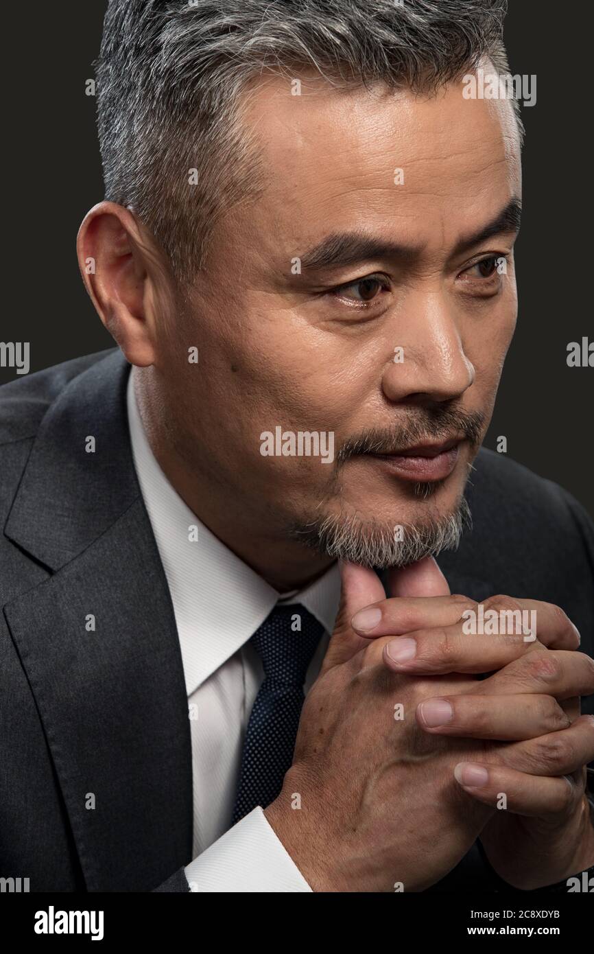 Finger touch chin thinking hi-res stock photography and images - Alamy