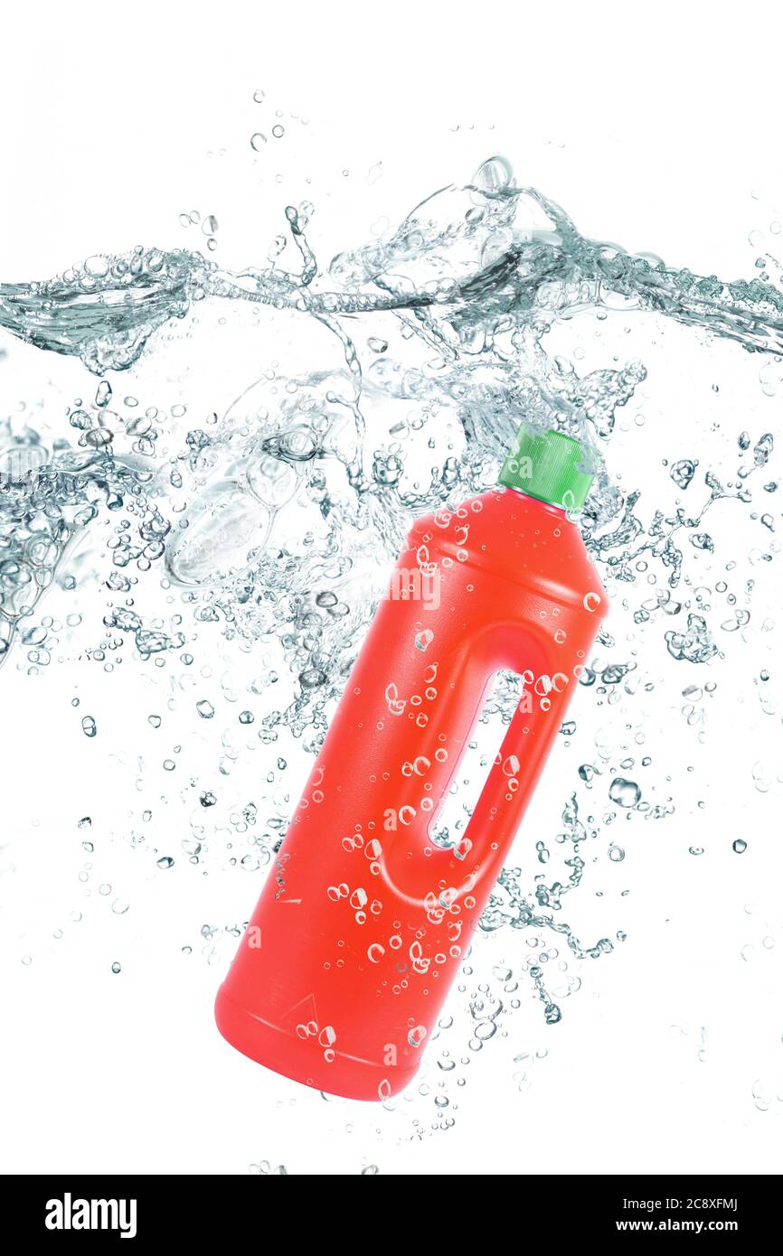 red plastic bottle falling in water Stock Photo Alamy