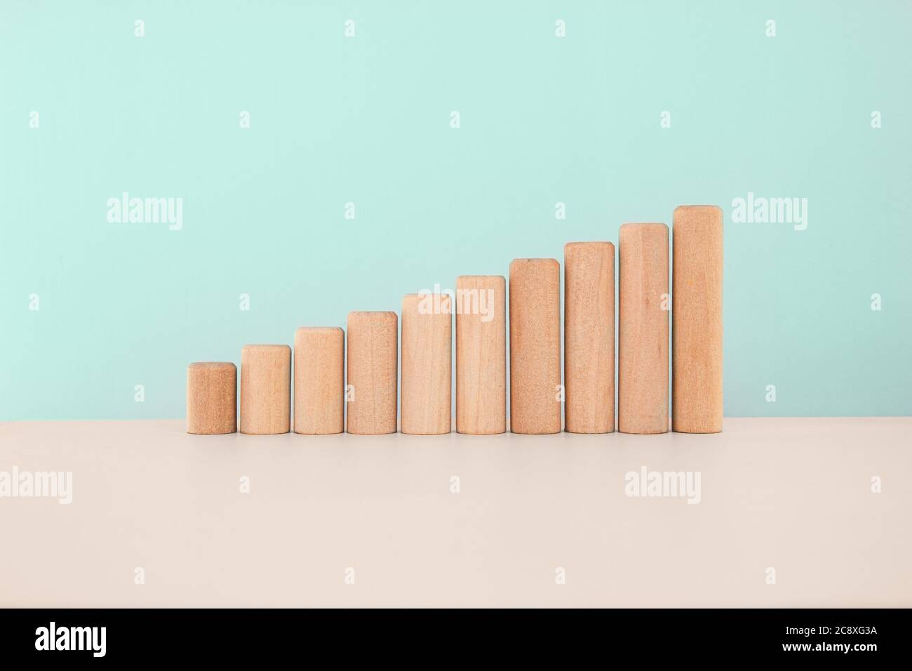 Increasing graph bar, infographic diagram, chart on wooden table over ...