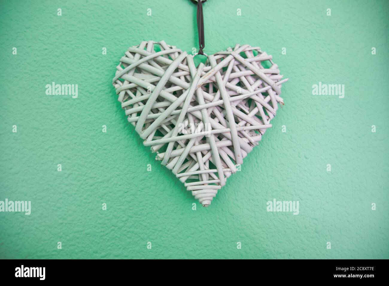 white heart on a green background Stock Photo - Alamy