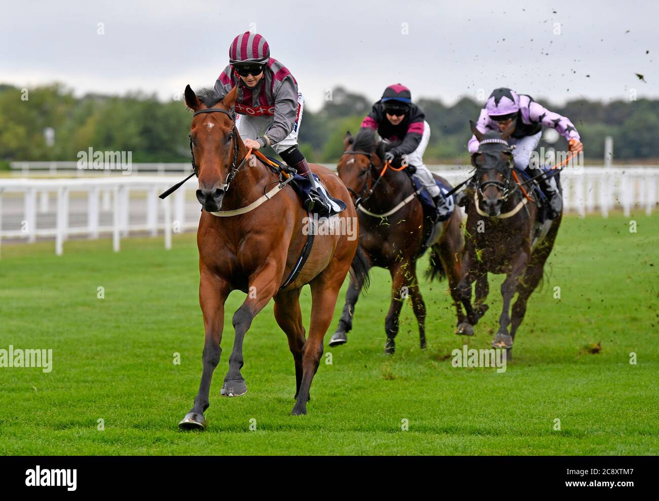 Hollie Doyle on board Pettochside wins the Watch Free Race Replays on attheraces.com Handicap at Royal Windsor Racecourse. Stock Photo