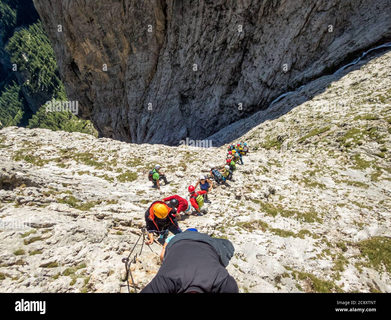 Climbing On The Pisciadu Via Ferrata Of The Sella Group In The 