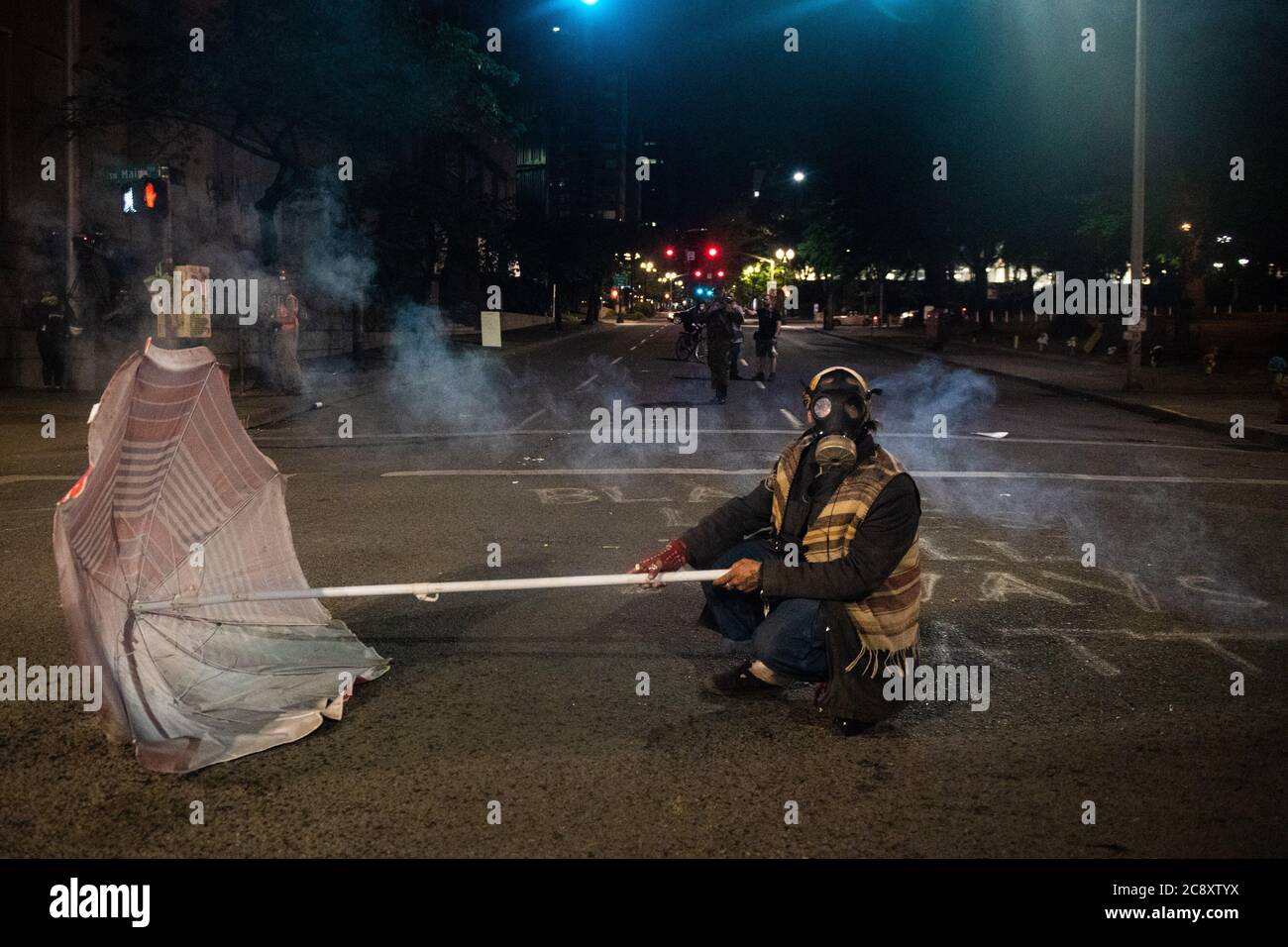 Portland, United States. 26th July, 2020. PORTLAND, OR - JULY 26: Protestors clash with Federal Protections Officers outside the Mark O. Hatfield United States Courthouse on July 26, 2020 in Portland, Oregon. Photo: Chris Tuite/imageSPACE Credit: Imagespace/Alamy Live News Stock Photo