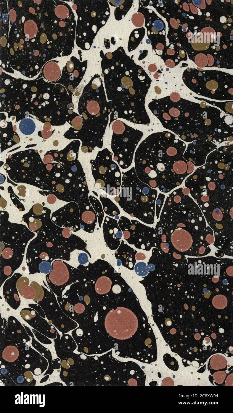 Decorative endpaper from a nineteenth century book.  Paper marbling was used to produce both endpapers and book covers. Stock Photo