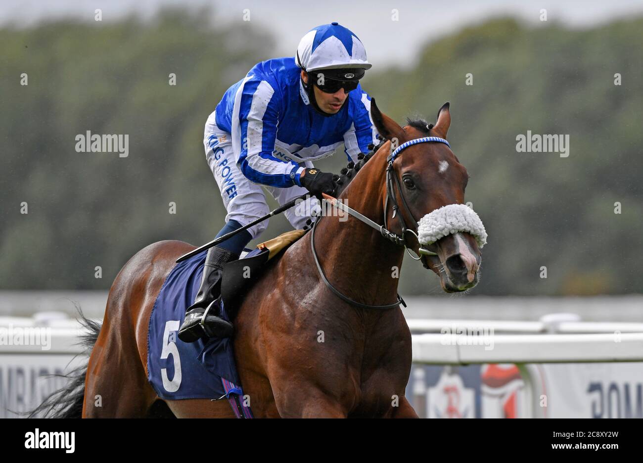 Silvestre De Sousa on board Mystery Smiles wins the British EBF Maiden Stakes at Royal Windsor Racecourse. Stock Photo